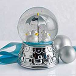 Silver rubber duck snow globe