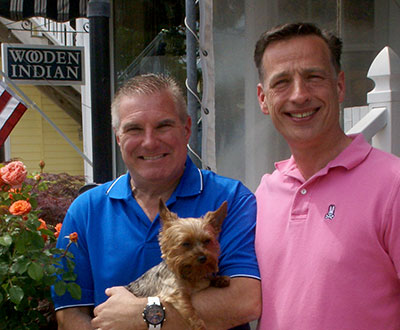 Owners Paul Roscosky and Joe Yasik, with their Yorkie Beau.