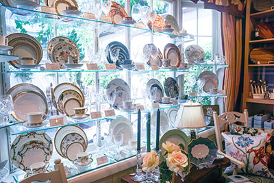 Wall of fine china at the Wooden Indian Ltd